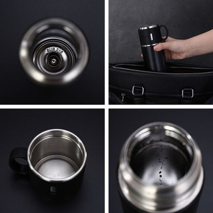 1 TERMO DE ACERO INOXIDABLE  CON 2 TAZAS INCLUYE BOLSA DE REGALO